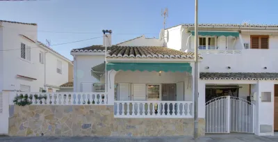 MAGNÍFICO ADOSADO EN PLAYA DE ALMENARA 0