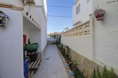 MAGNÍFICO ADOSADO EN PLAYA DE ALMENARA 53
