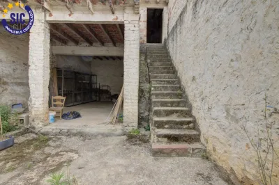 AMPLIA CASA DE PUEBLO EN LA LLOSA 36
