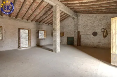AMPLIA CASA DE PUEBLO EN LA LLOSA 46