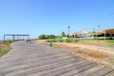 PLANTA BAJA EN URBANIZACIÓN DE ALMENARA PLAYA 42