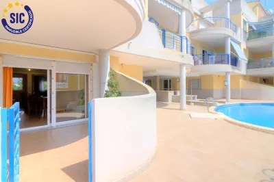 PLANTA BAJA EN URBANIZACIÓN CON PISCINA EN XILXES PLAYA 34