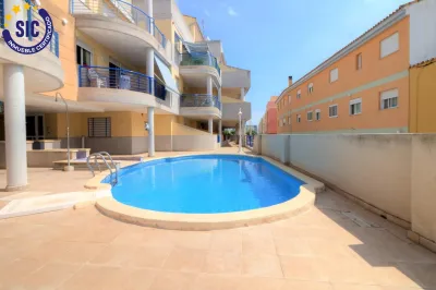 PLANTA BAJA EN URBANIZACIÓN CON PISCINA EN XILXES PLAYA 35