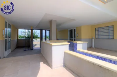 PLANTA BAJA EN URBANIZACIÓN CON PISCINA EN XILXES PLAYA 38