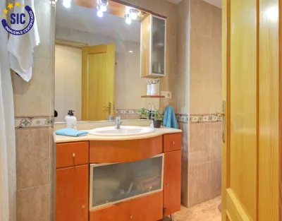 AMPLIO PISO CON GARAJE Y TRASTERO 13