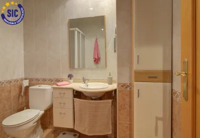 AMPLIO PISO CON GARAJE Y TRASTERO 18