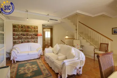 CHALET ADOSADO ESQUINERO A UN PASO DE LA PLAYA DE CORINTO 15