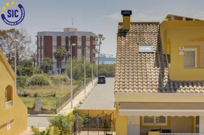 CHALET ADOSADO ESQUINERO A UN PASO DE LA PLAYA DE CORINTO 73